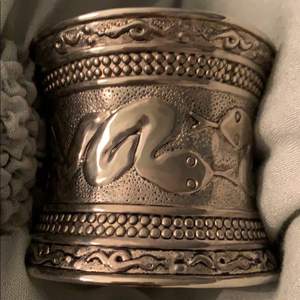 Silver cuff bracelet.